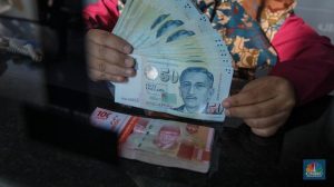 Rupiah Tertekan, Dolar Singapura Dekati Level Rp14.000 | Equityworld EWF Medan